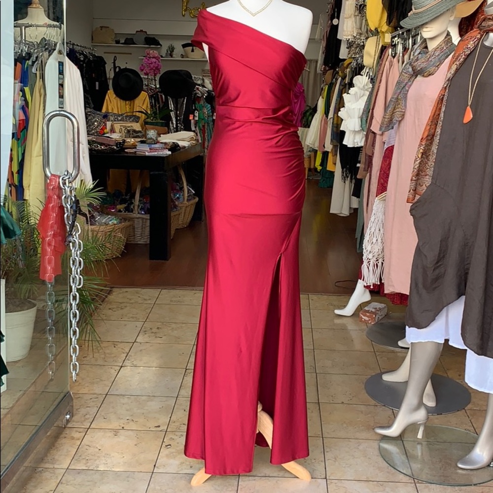 Burgundy one shoulder gown with split